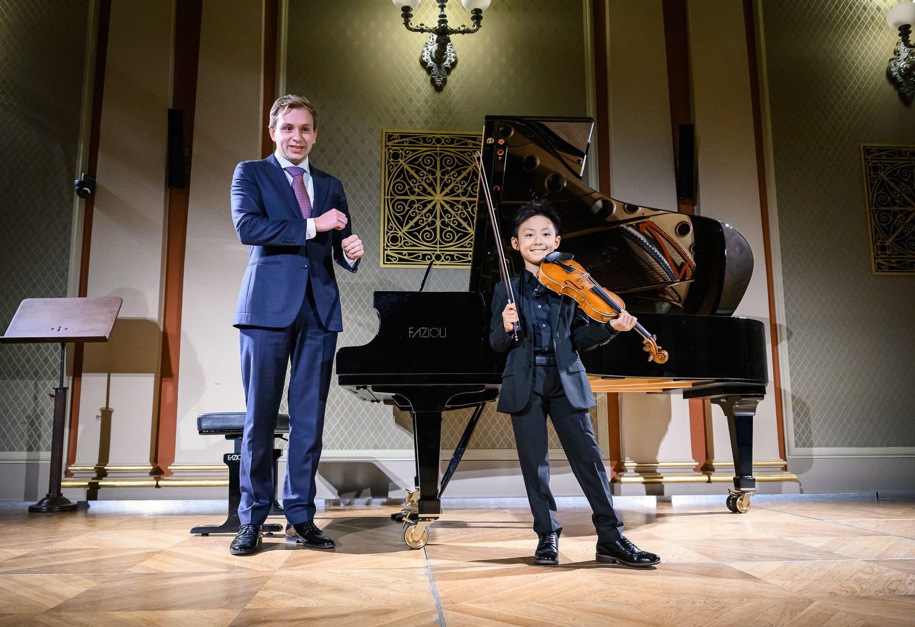 Een vrolijk moment na afloop met Ruben Plazier en een jonge violist